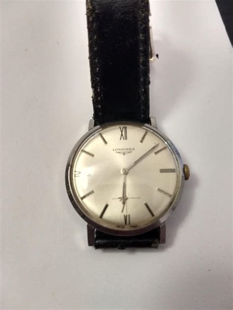 old longines watch identification.